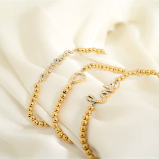 Stackable "Love" Charm Beaded Bracelet