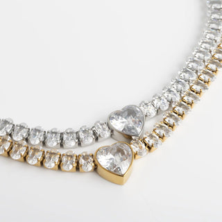 Bracelet with heart-shaped crystals on a light gray background
