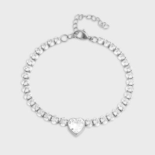 Silver bracelet with heart-shaped clasp on a light gray background