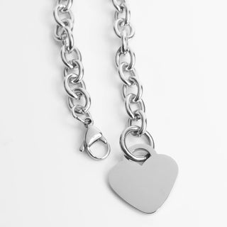 Silver chain Heart Bracelet or Anklet  with a heart-shaped tag on a light gray background