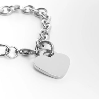 Silver chain Heart Bracelet or Anklet  with a heart-shaped tag on a white background