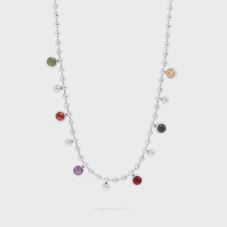 Necklace with colorful gemstones on a white background