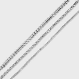 Silver beaded chain on a light gray background