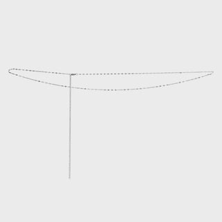 Silver Lip Belly Chain on a light gray background