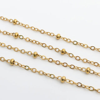 Gold Satellite Belly Chain on a white background