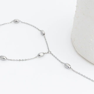 Silver Statement Bead Hand Chain on a white background