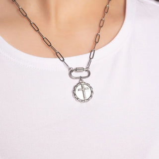 Necklace with a cross pendant on a white background
