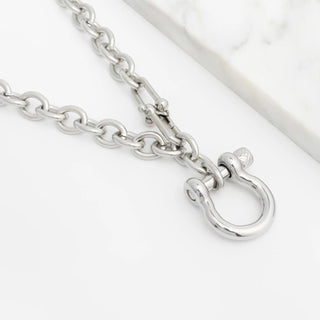 Silver chain with a clasp on a white background