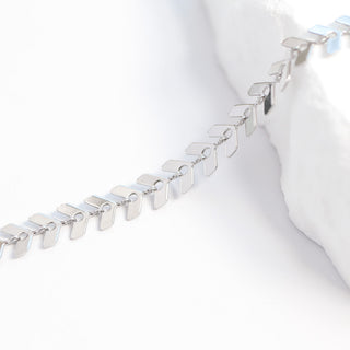 Silver bracelet on a white background
