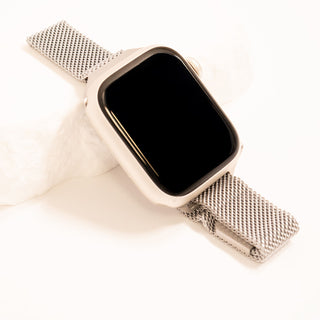 Smartwatch with a metal mesh band on a white background