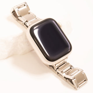 Smartwatch with a gold metal band on a white background