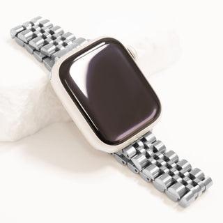 Smartwatch with a silver metal band on a white background