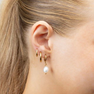 14K Gold Filled PLUS™ Circle Huggie Hoop Earrings- Model