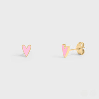 Heart-shaped earrings with pink centers and gold outlines on a light gray background