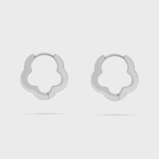 Pair of silver hoop earrings on a light gray background
