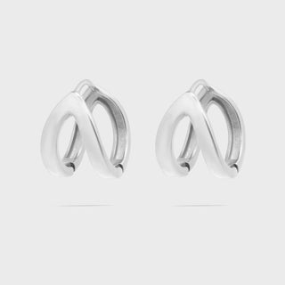 Pair of silver hoop earrings on a light gray background