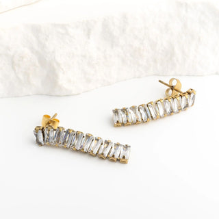 Gold and clear crystal bar-shaped earrings on a white background