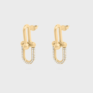 Gold hoop earrings with small beads on a light gray background