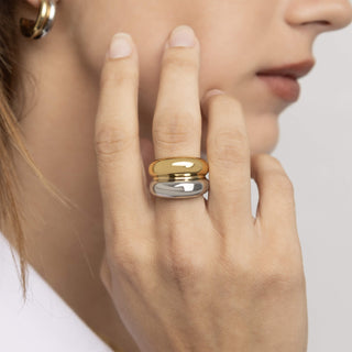 Mixed Metal two tone silver and gold statement ring on womans hand
