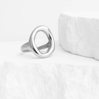 Silver ring on a white background