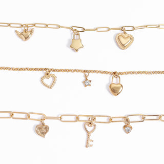 Heart With Cubic Zirconia Charm with other charms on different Bracelet chains