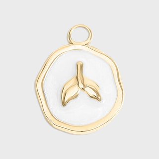 Gold pendant with a leaf design on a light gray background