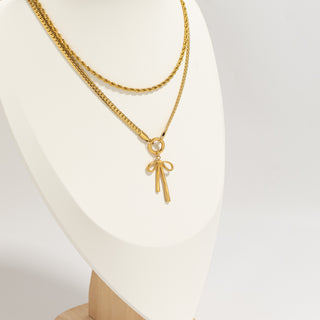 Gold Long Bow Charm on Curb Chain