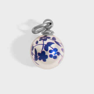 Pendant with floral design on a white background