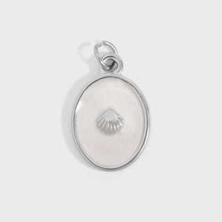 Silver pendant with a shell design on a light gray background