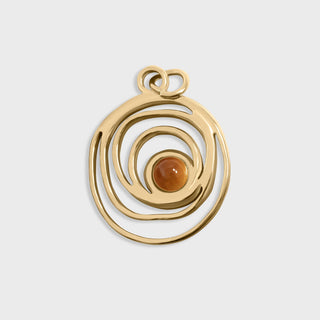 Gold pendant with a central brown gemstone on a light gray background