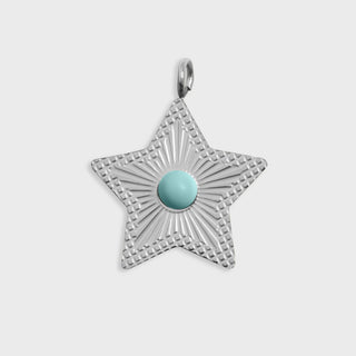 Silver star-shaped pendant with a turquoise center on a light gray background