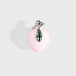 Pink teardrop-shaped peach pendant with a silver hook on a light gray background