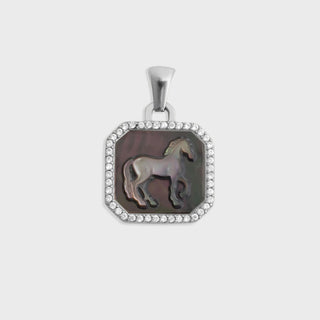 Pendant with horse design on a white background