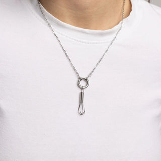 Silver necklace with a unique pendant on a white background