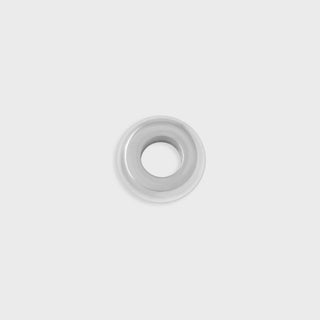 Silver spacer bead on a light gray background