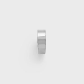 Silver spacer bead on a light gray background