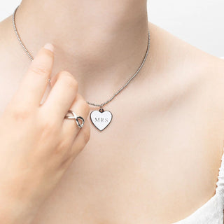 Heart-shaped pendant necklace with 'MRS'