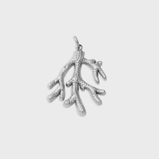 Silver coral branch pendant on a light gray background