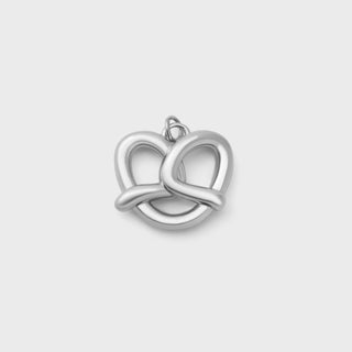 Silver pretzel pendant on a light gray background