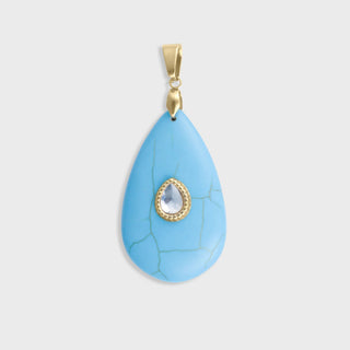 Teardrop-shaped blue pendant with gold accents on a light gray background