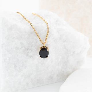 Gold Oval Healing Stone Charm- studio