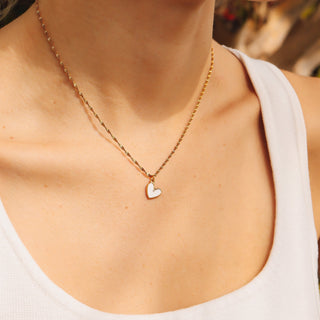White epoxy heart on a chain lifestyle